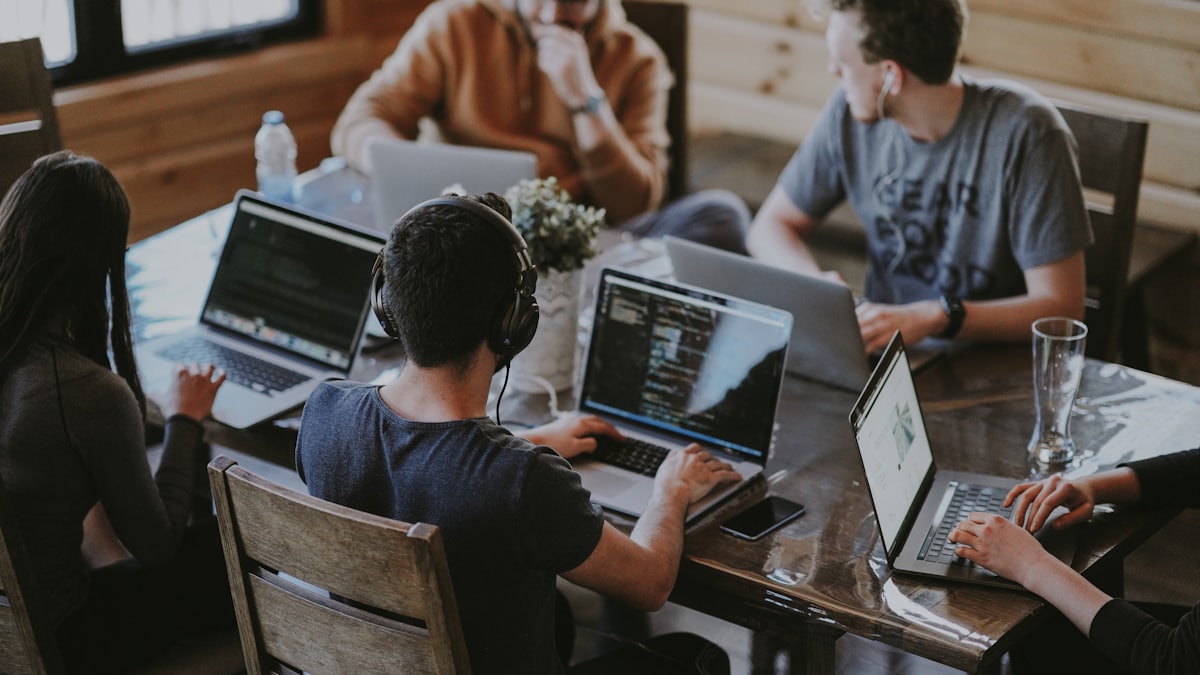 A small team working around one table